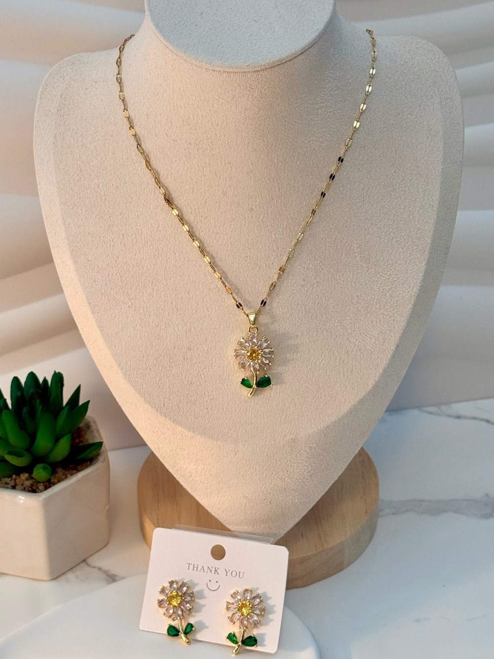 Gold Daisy Drop Necklace and Earrings Set with Green Enamel Leaves